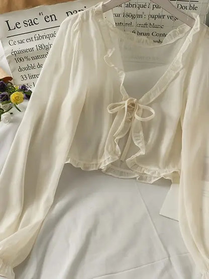 Luciana - Transluzente Bluse mit Schleife